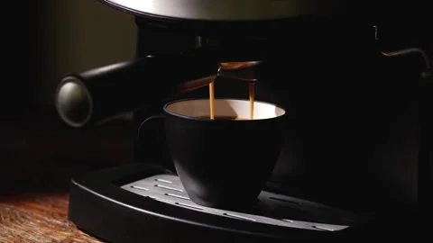 Close up coffee pouring espresso cup automatic caffeine brew dark service in 4k Stock Footage 336561964