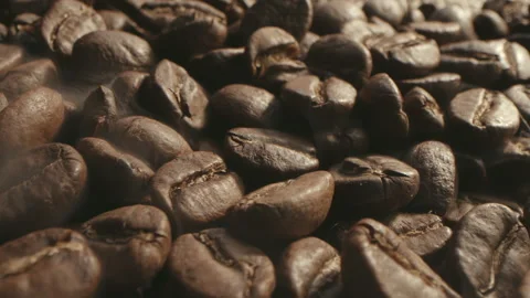 Close-up of coffee seeds. Flavored coffee beans are roasted smoke from coffee Stock Footage 256348239