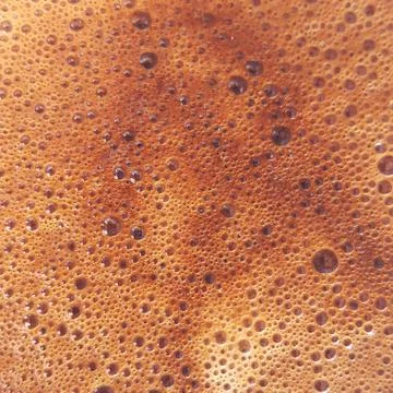 Close up of a coffee surface bubble. Stock Photos