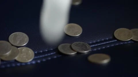 Close up coins with macro lens motion coins falling. Stock Footage 148916000