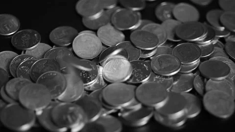 Close up coins with macro lens motion coins falling. Stock Footage 148916423