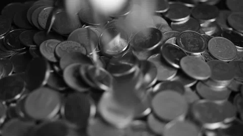 Close up coins with macro lens motion coins falling. Stock Footage 148916432