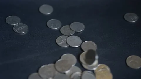 Close up coins with macro lens motion coins falling. Stock Footage 148916606