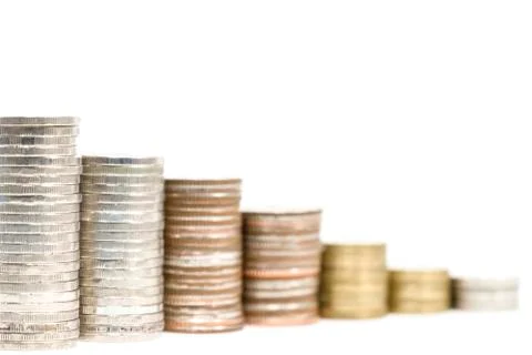 Close up coins stack decrease on white background for financial economy and i 库存照片