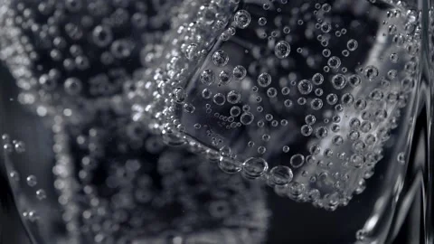 Close up cold bubbly carbonated soft drink with ice Stock Footage 160562325