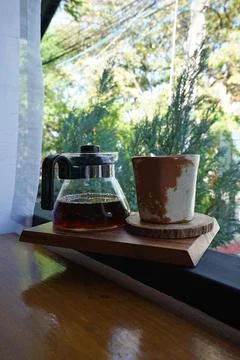 Close up cold drip coffee with ceramic clay cup Stock Photos
