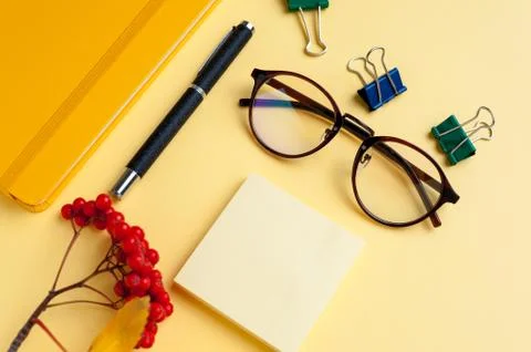 Close up collage of eyeglasses with office stuff Stock Photos