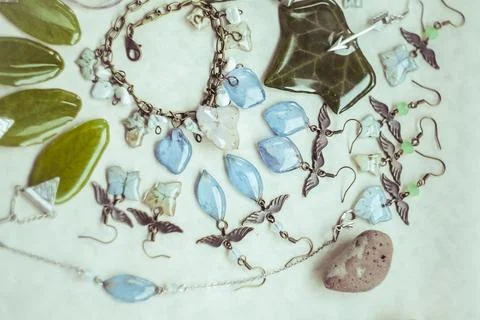 Close up collection of craft bijouterie with gemstone concept photo Stock Photos
