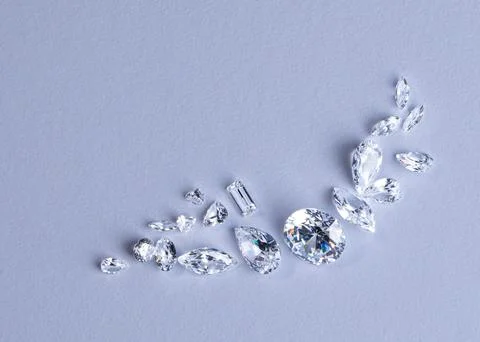 Close up collection of diamonds different cuts and sizes. Stock Photos