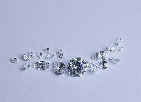 Close up collection of diamonds different cuts and sizes. Stock Photos