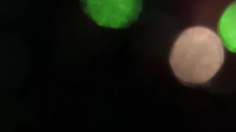 Close-up color bokeh leak reflection on black video Video stock 317462278