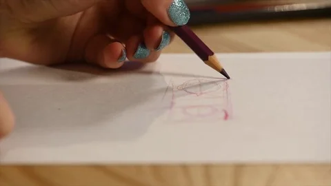 Close up of color pencil head breaking Stock Footage