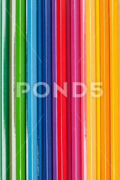 Close up of color pencils on colorful background Stock Photos