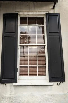 Close up of the color windows of a colonial era home Stock Photos