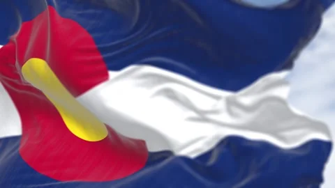 Close-up of Colorado state flag waving in the wind on a clear day Video stock 301235986