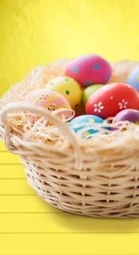 Close up of colored easter eggs in basket Stock Photos
