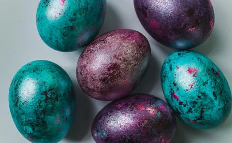 Close-up of colored Easter eggs. Screensaver for the bright holiday of Easter. Stock-Fotos