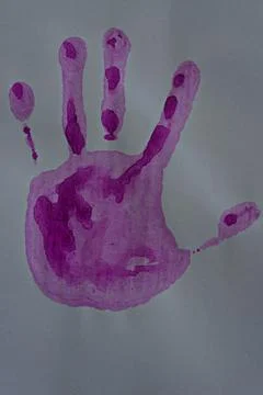 Close up of colored hand print on white background Stock Photos