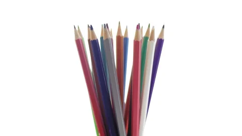 Close-up Colored Pencils Revolve in a White Background Stock Footage 112617598