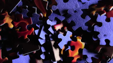 Close-Up of Colored Puzzle Pieces that Rotating Counterclockwise Stock Footage 252408672