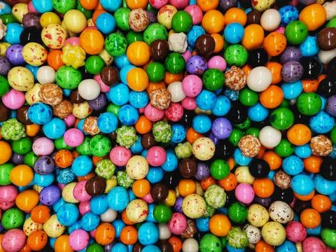 Close-up colored round chocolate. Stock Photos