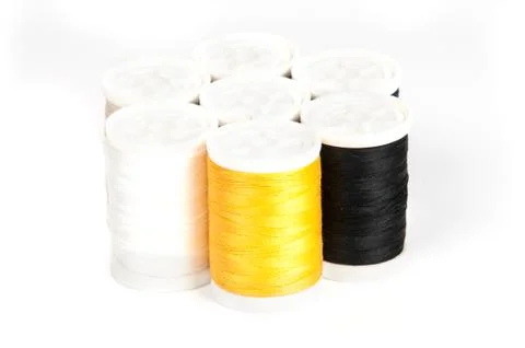 Close up of colored thread bobbins Stock Photos