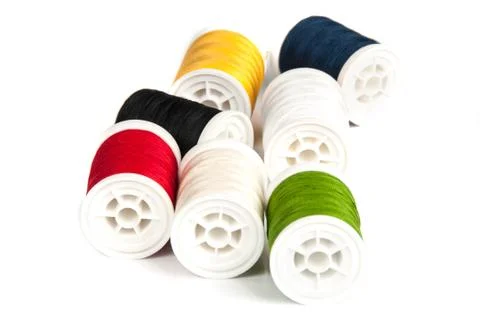 Close up of colored thread bobbins Stock Photos