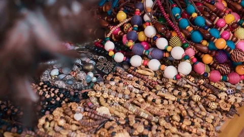 Close up of colorful bracelets on table Stock Footage 78694770