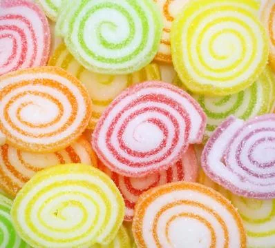 Close-up of colorful candy on white background. Stock Photos
