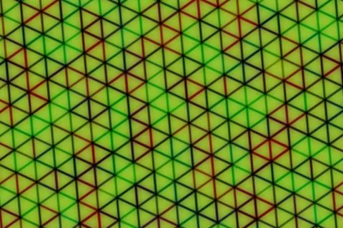 Close-up of colorful geometric pattern with green and black Stock Illustration