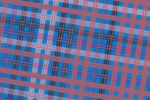 Close-up of colorful metal grid pattern with blue and purple tones Stock Photos
