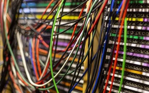 Close-up of a colorful network server cables and switches in a data center... Stock Photos