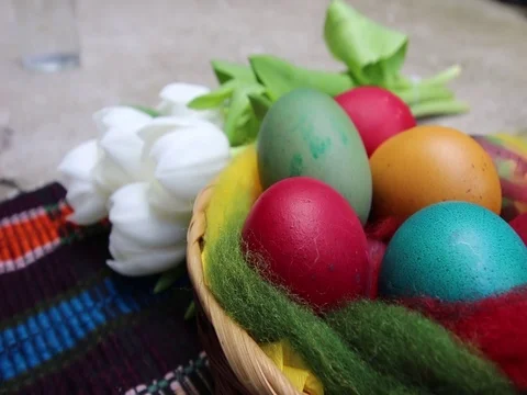 Close up of colorful painted easter eggs in a basket Video stock 84803401