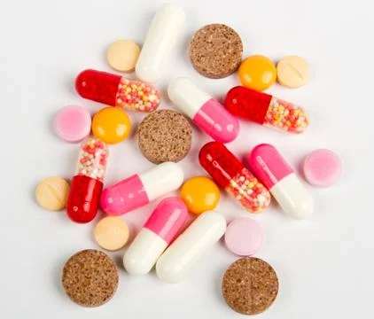 Close up colorful pills isolated on white Stock Photos