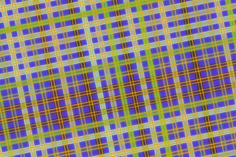 Close-up of colorful plaid fabric with vibrant pattern Stock Photos