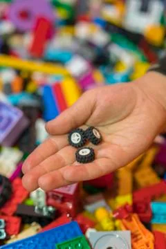 Close up of colorful plastic bricks on the floor. Early learning. Children's  Stock Photos