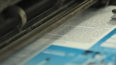 Close-up of colorful printing of leaflets at printing house Stock Footage 43739595
