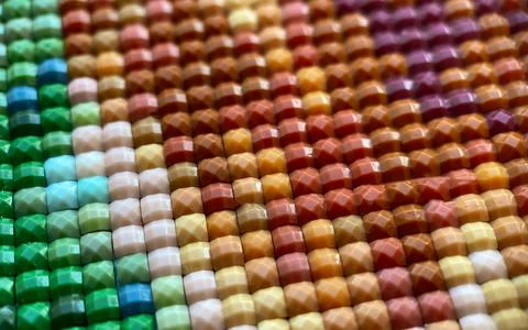 Close-up, colorful texture square diamond embroidery bright. Hobbies and Stock Photos