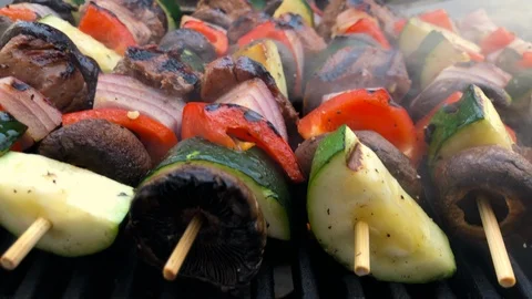 Close Up of Colorful Vegetable Kebabs on the Grill 104811001