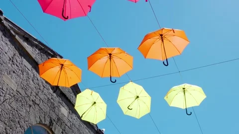 Close up colourful hanging umbrellas Video stock 190076304