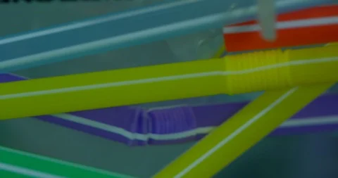 Close Up Of Colourful Plastic Straws Floating On The Polluted Ocean  Stock Footage 113359839