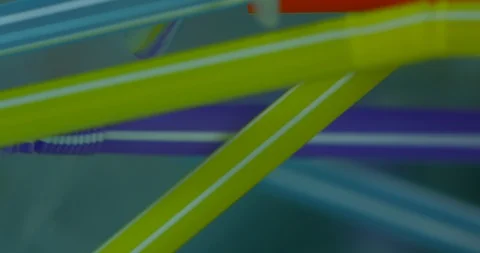 Close Up Of Colourful Plastic Straws Floating On The Polluted Water  Stock Footage 113359898