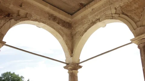 Close up of columns and arches in an ancient city sculpture historical exterior Stock Footage 98154434