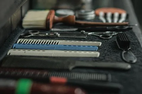 Close up of combs and brushes on the table Stock Photos