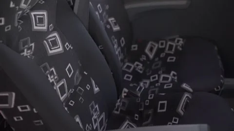 Close-up of comfortable empty black velvet seats in the passenger bus Видео 244540793