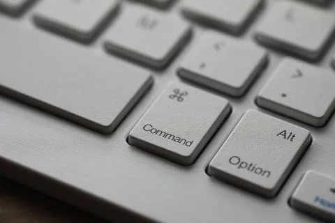 Close-Up of Command, Option, and Alt Keys on a White Computer Keyboard Stock Photos