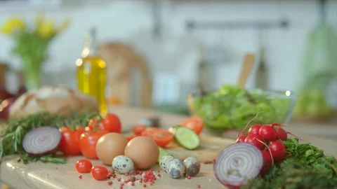Close up commercial set of cutting table with fresh green ingridients at the Stock Footage 107557421