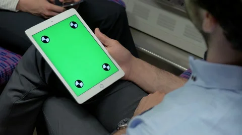 Close-up of commuter with his modern tablet on daily commute Stock Footage 67261206