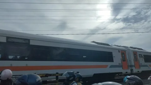 Close up of commuter train wheels speeding on the tracks Stock Footage 295114123