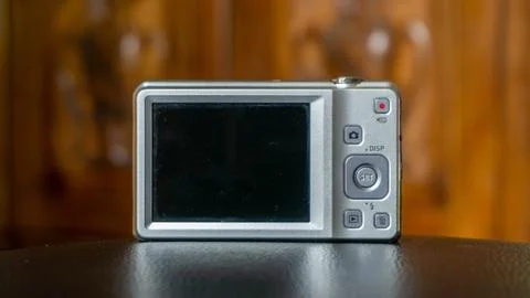 Close up of compact digital camera. Modern digital camera Stock Photos